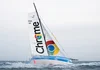 Photo du bateau de Basile Buisson et Kieran Le Borgne aux couleurs de Google Chrome en pleine mer.