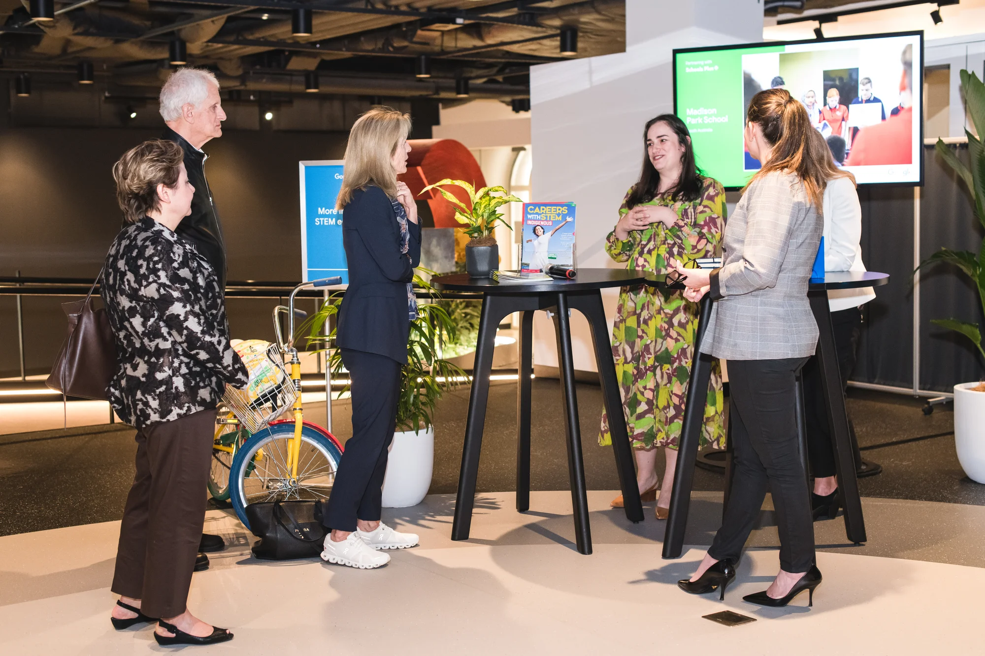 Google's Marie Efstathiou and Mel Silva with Schools Plus talking with Ambassador Kennedy and Consul General Christine Elder