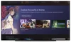 Image of Google TV “Explore the World of Anime” collection with anime character on the left and four title cards on the right showing “My Hero Academia”, “Attack on Titan”, “Blue Lock”, and “Spy X Family”