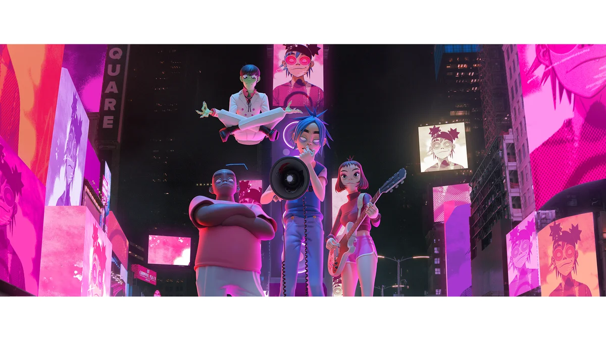 Four animated musicians stand several stories high in the middle of Times Square.
