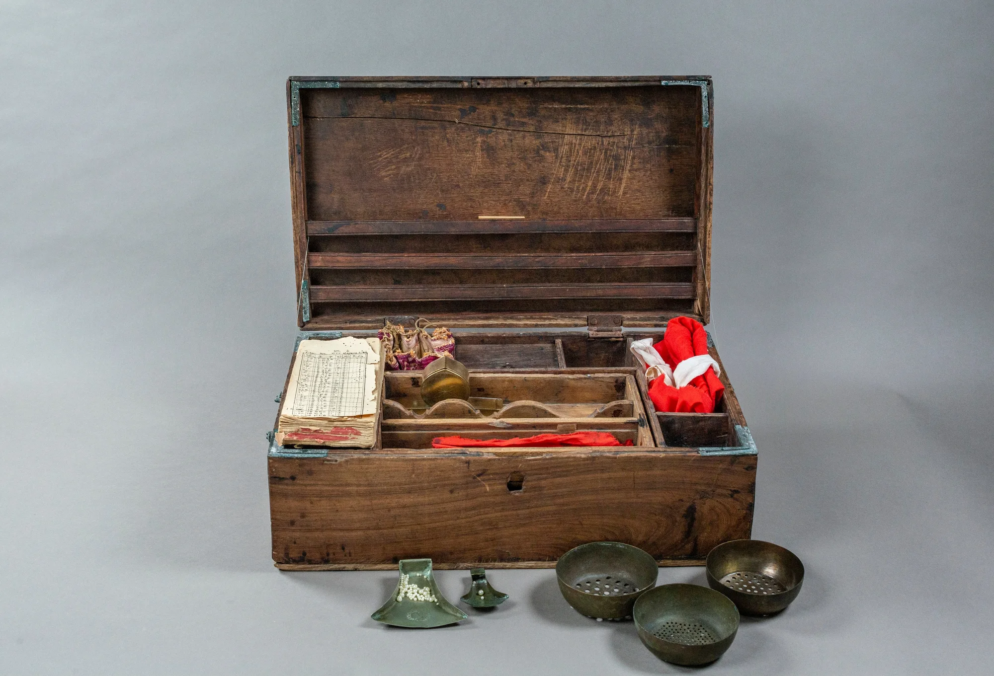 A picture of a Pearl Merchant's Chest against a grey background from the collection of Al Shindagha Museum