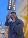 SoulCycle instructor Bryce, based in New York City, poses outside of a SoulCycle studio.