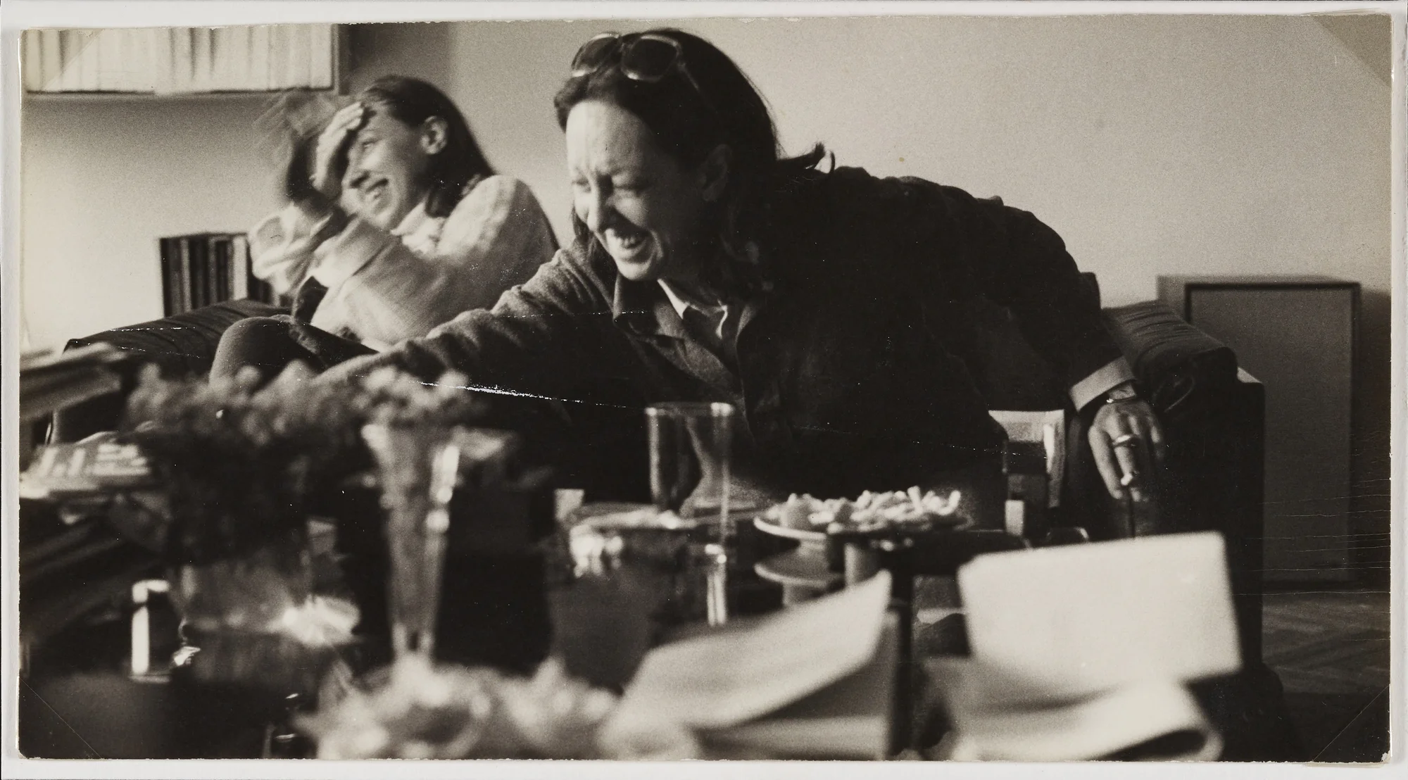 Explore the personal archive of art critic and feminist Carla Lonzi, with hidden gems like this rare photograph of a smiling Carla with a friend.