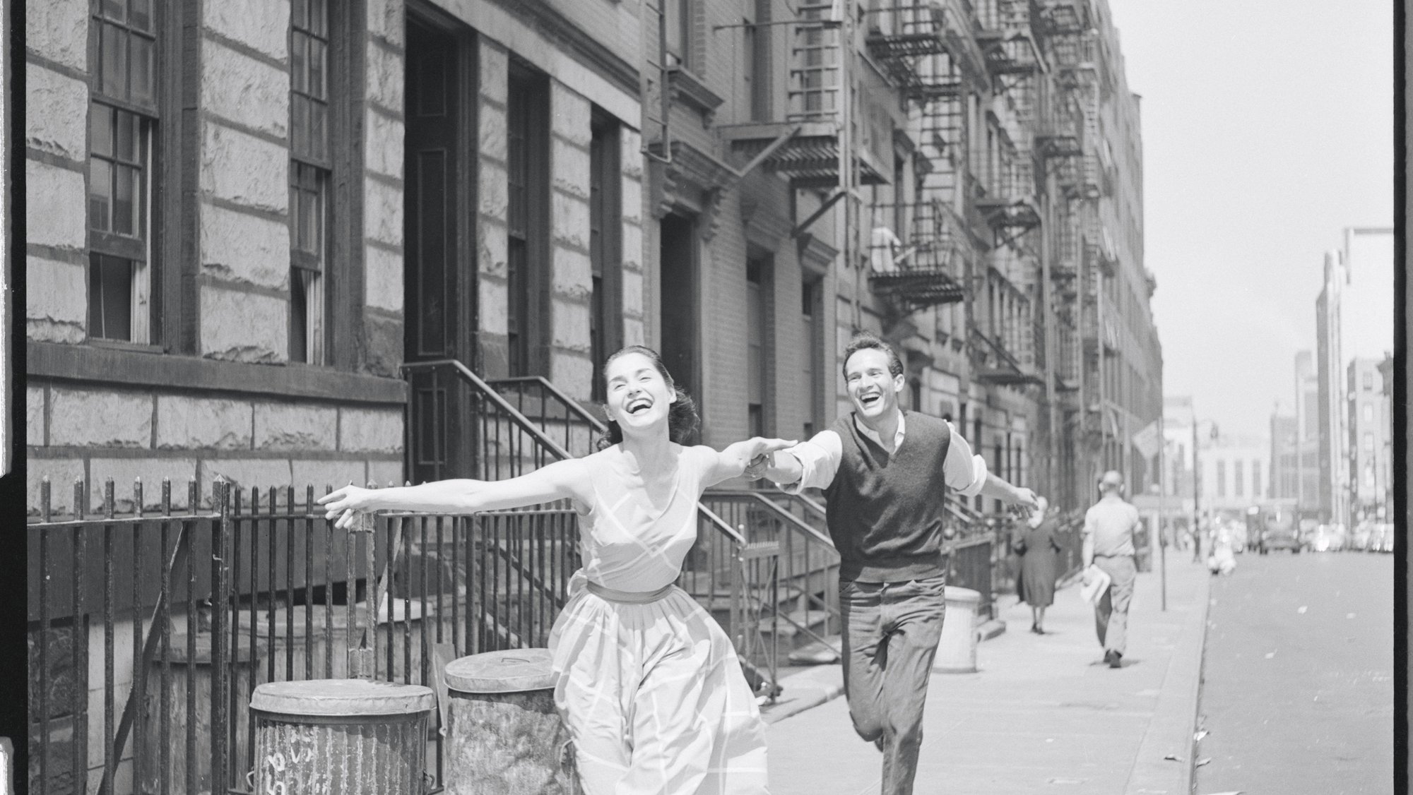 Carol Lawrence and Larry Kert on location (West 56th street between 9th and 10th ave) for West Side Story publicity shoot_NYPL.jpg