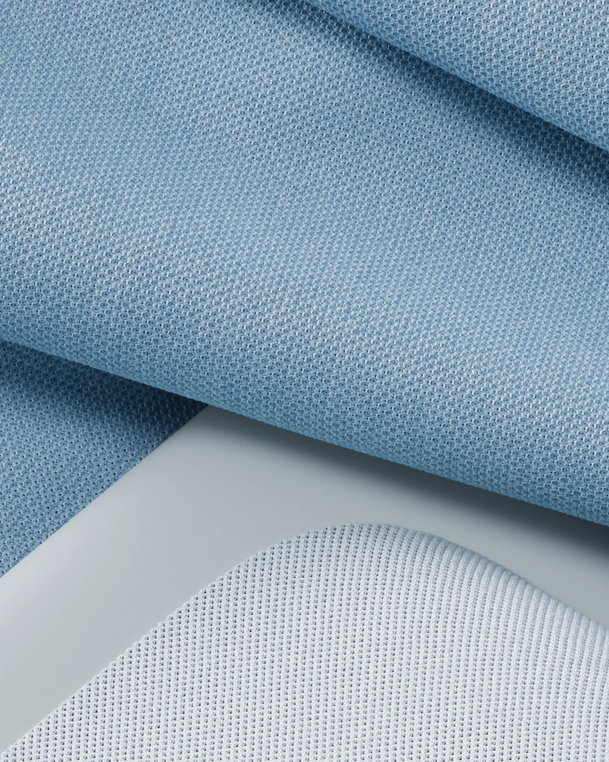 A close up of the fabric used on the Nest Hub in Mist.
