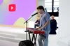 Charlie Puth playing electric piano at Made On YouTube event