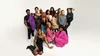 A group of people involved in the Ballroom scene take a portrait in front of a white background