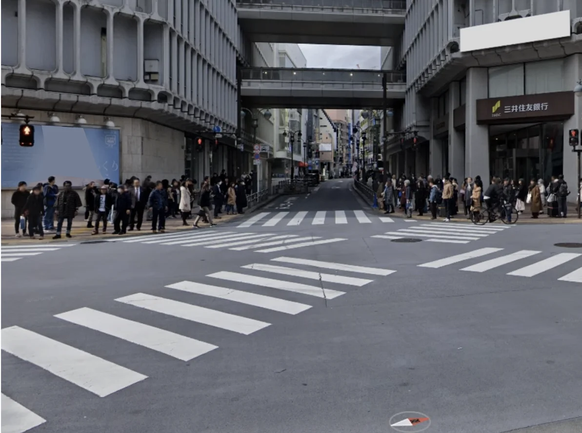 A street-level image of crosswalks in Tokyo