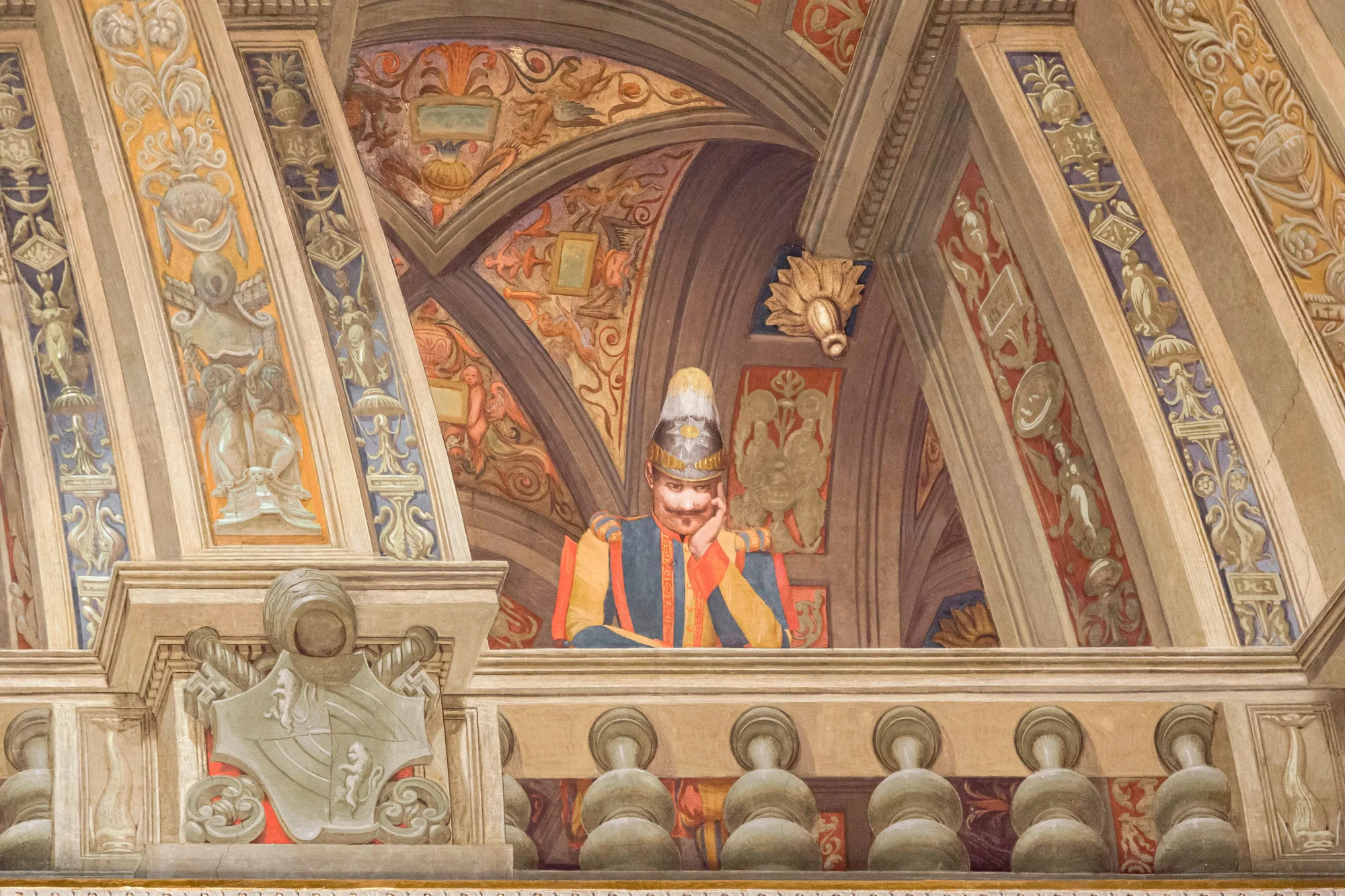 Painting of a man standing on a richly decorated balcony.