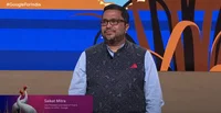 image of Google’s Saikat Mitra speaking at event in India