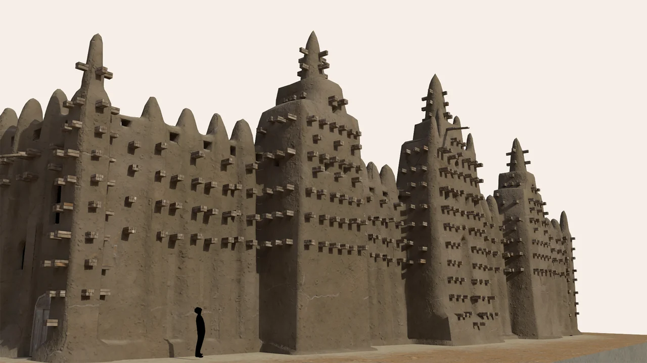 A 3D model of the Grand Mosque of Djenne with a person standing below for scale.