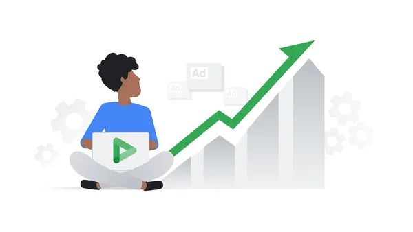 Person sitting cross legged with laptop with Display & Video 360 next to a bar chart and arrow showing upward trend.