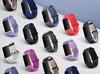 A display of the Fitbit Charge 3 in a variety of colors and band styles