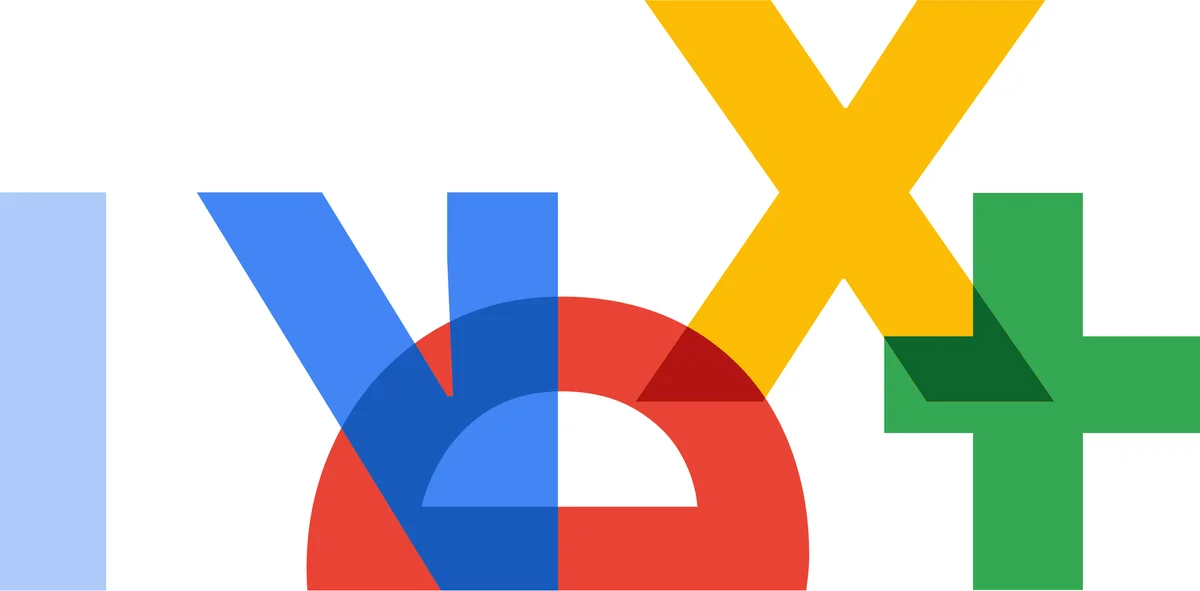 An abstract logo showing the word 'Next' in jumbled up letters in blue, red, yellow and green.