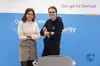 From L-R the female founders of ShareID Sawsen Rezig and Sara Sebti behind a podium with the Google for Startups signage in the background