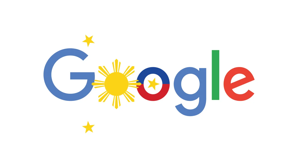 The Google logo, featuring a yellow sun as the first "o." The second "o" features the Filipino flag colors of blue and red with a star in the center.