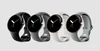 A line up of Google Pixel Watches with an assortment of active band colors.