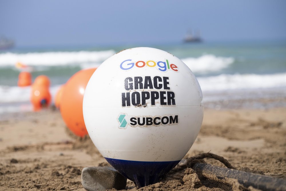 An image of the Google buoy landing on the sandy beach of Bude, Cornwall