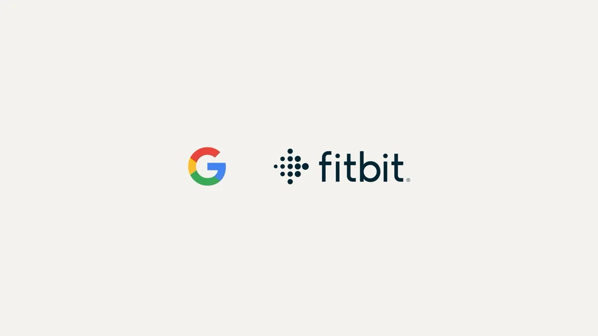 The Google logo next to the Fitbit logo.