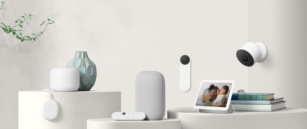 Image showing various Nest and Google Home products on different table tops and mounted to the wall.