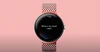 Pixel Watch 2 con la pregunta "¿Cuál es mi ritmo cardíaco?" sobre fondo rosa.