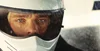 A picture of a man in a driving helmet from Group B starring Richard Madden