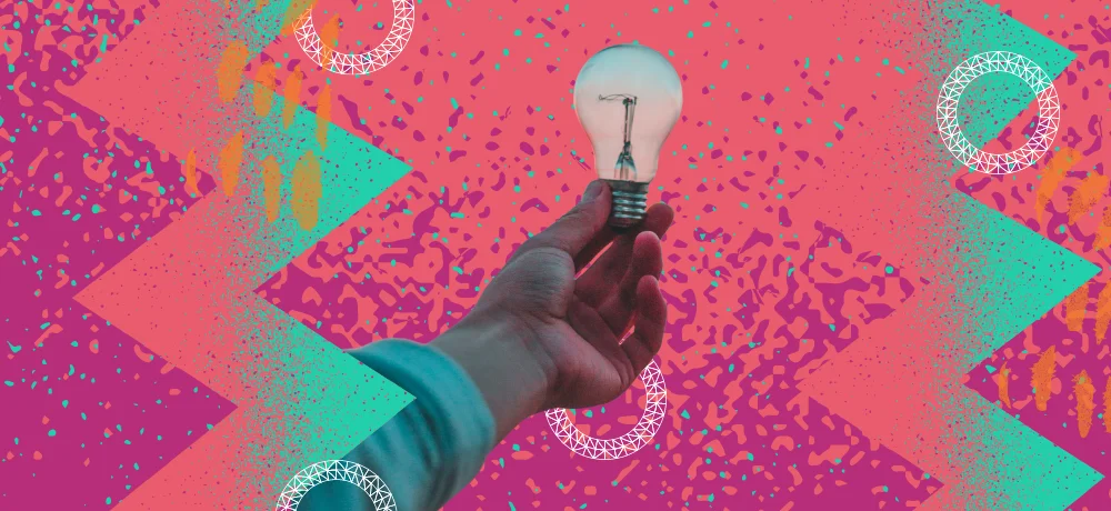 A hand holds a lightbulb surrounded by illustrated zig-zag lines and magenta colors.