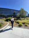 Aurane standing outside a Google Building.