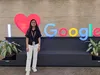 Srishti posing in front of "I <3 Google" sign