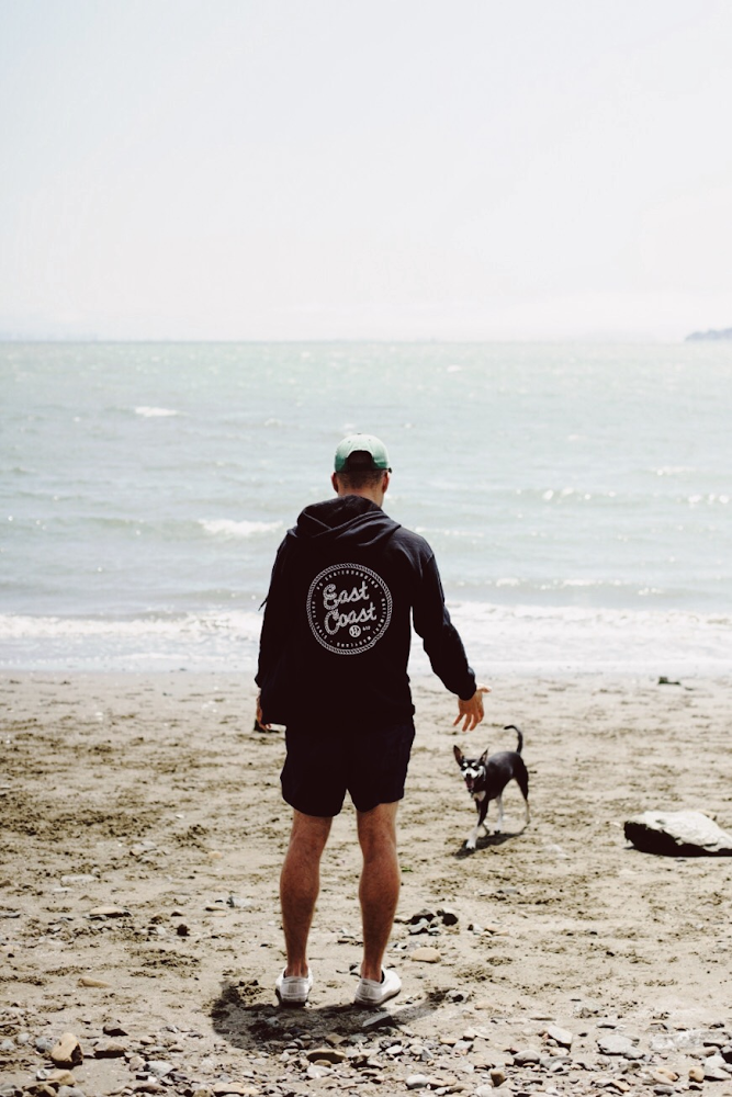 Bobby on the beach with his dog