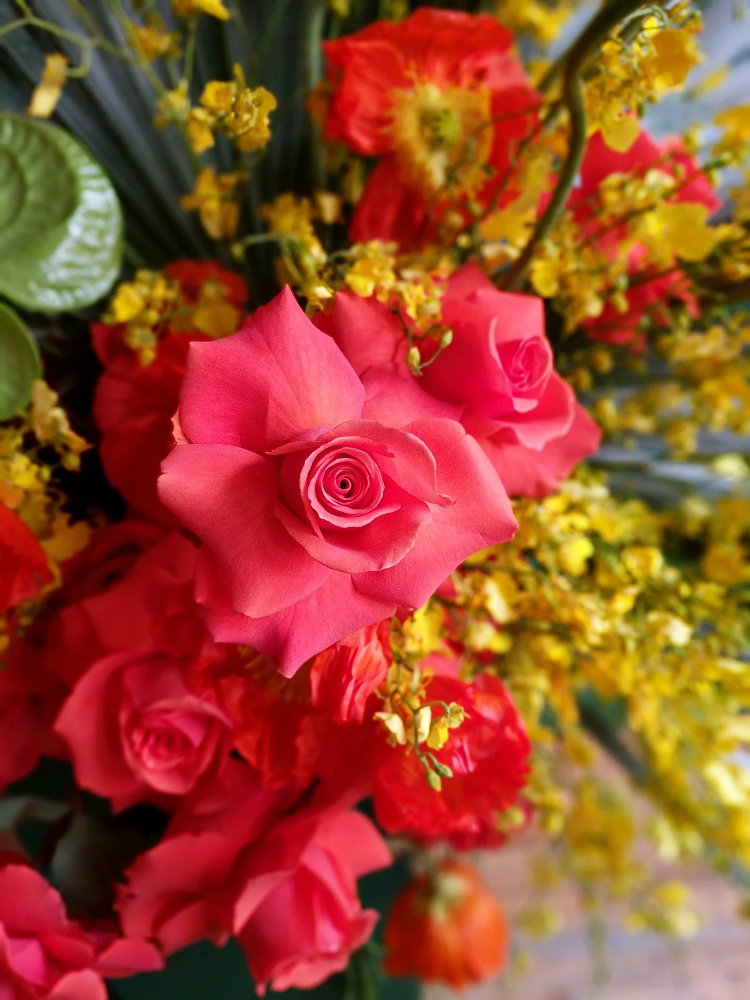 A pink and yellow floral arrangement