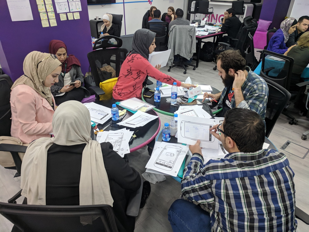 Developers from Jordan discussing their app design