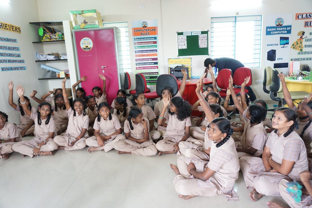 A photo of girls in Chennai participating in a technology program as part of International Women’s Day 2022.