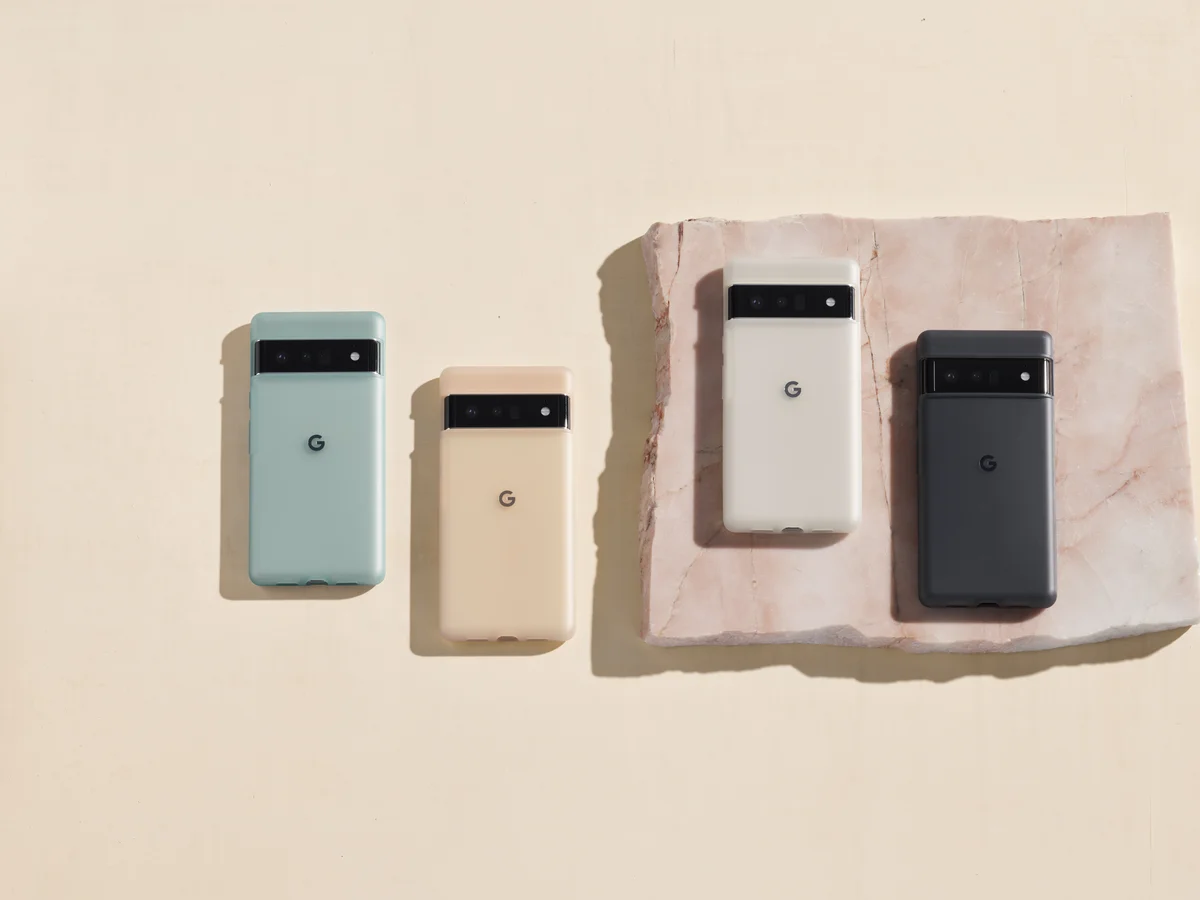 Article's hero media. Pixel 6 and Pixel 6 Pro cases on a pink background.