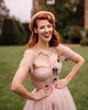 YouTube Creator Jessica Kellgren-Fozard in a pink vintage dress