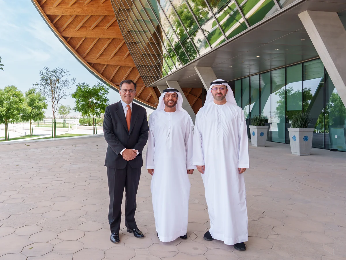 Image of three men standing