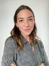 woman with long hair in striped shirt