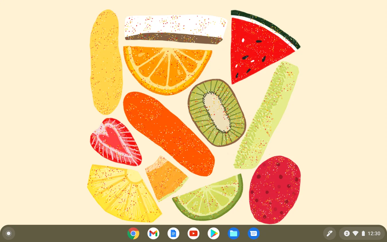 Chromebook background depicting a variety of fruits sprinkled with chili powder, laid out into a pattern