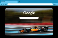 Image of a Chrome browser window with the McLaren F1 car, showcasing the Chrome logo on its engine cover.