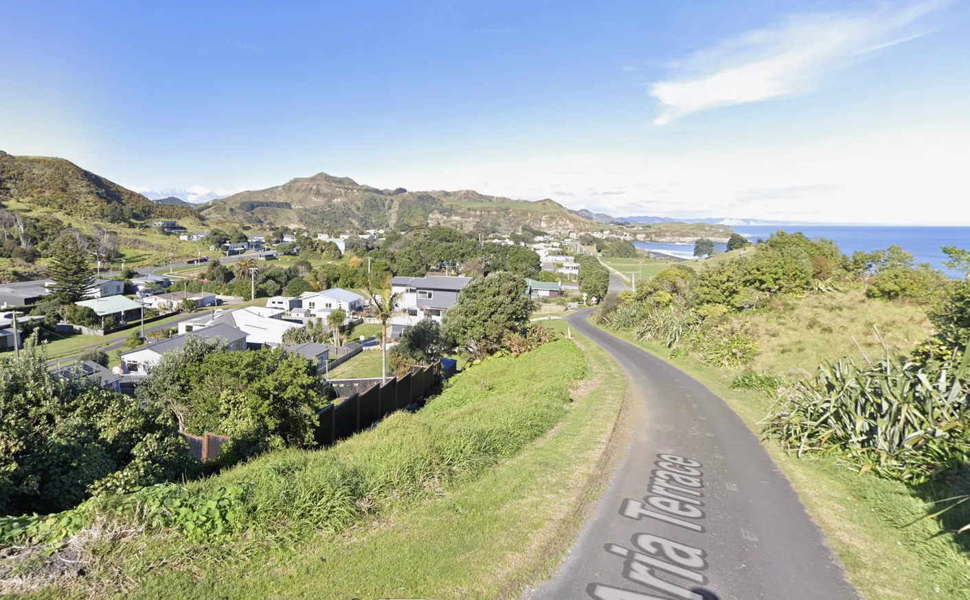 Shown is a Street View image of Mokau, New Zealand