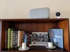 Nest camera on top of a bookshelf