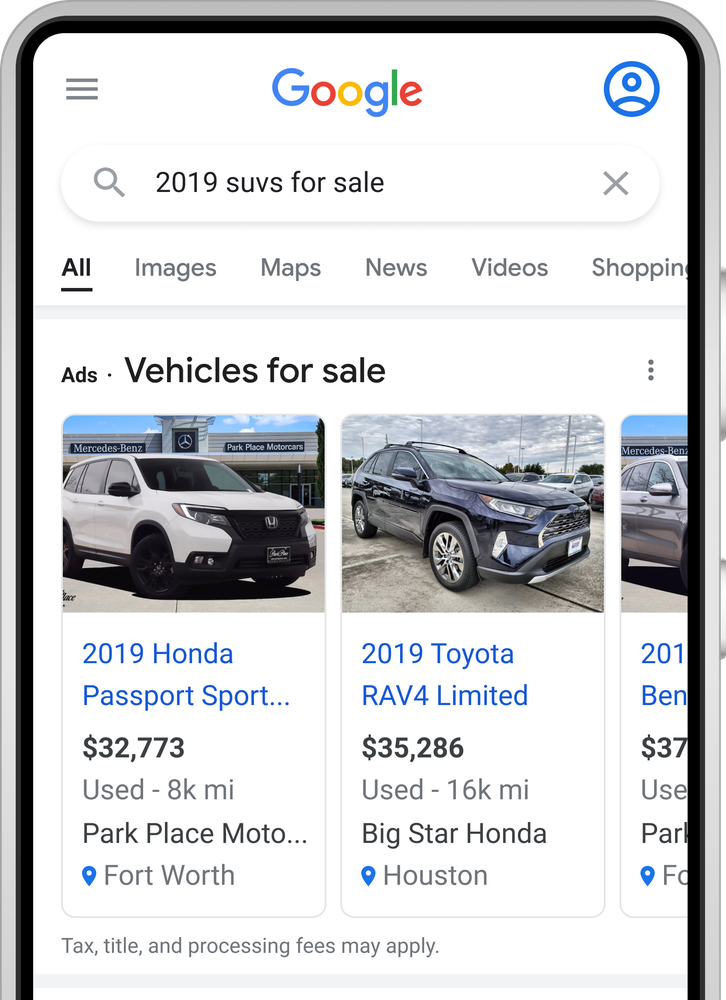 Smartphone shows Search results for “2019 suvs for sale.” There are two ads, each showing a picture of a car and its details. The ad on the left shows a white SUV and the ad text below the image says “2019 Honda Passport Sport, $32,773, Used - 8k mi, Park Place Motors” and has a location icon to indicate the car is in Fort Worth, Texas. The ad on the right shows a dark blue SUV and the ad text below the image says “2019 Toyota RAV4 Limited, $35,286, Used - 16k mi, Big Star Honda” and has a location icon to indicate that the car is in Houston, Texas.