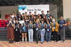 Attendees of the Ho Chi Minh City WTM IWD event pose in front of the “Dare to Be” sign