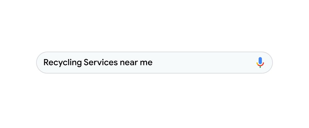 Illustration of a Google Search bar with the words "recycling services near me" in it.