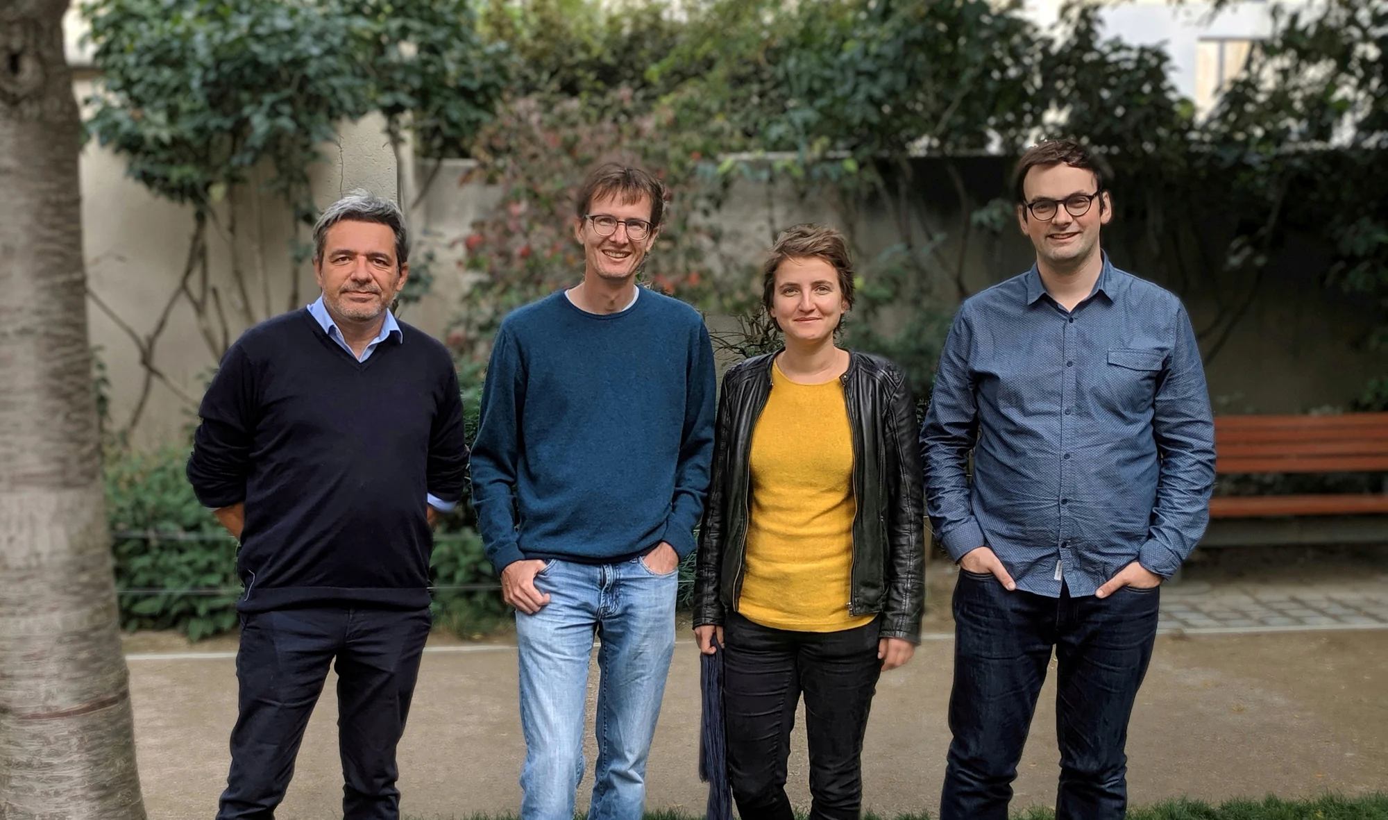 Four of the Open Food Fact team members standing outside together.