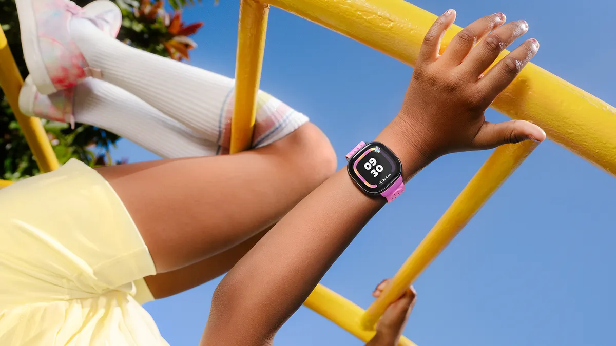 Closeup of Fitbit Ace LTE on kid's wrist