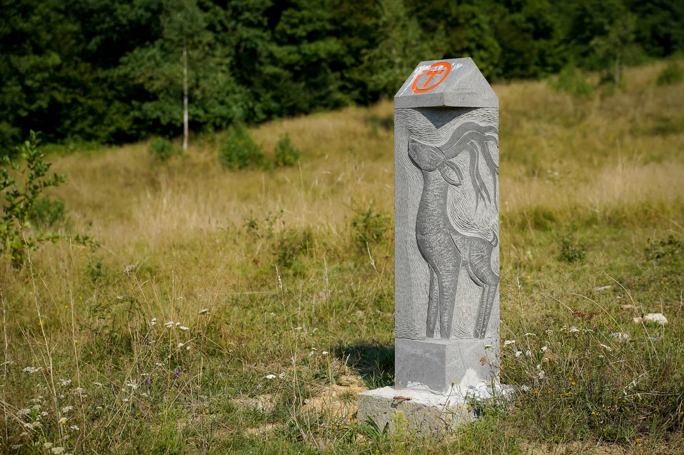 One of the andesites bollards that mark the Via Transilvanica trail, representing a stag.