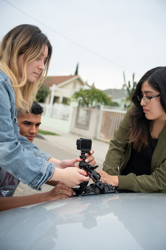 Students mount their camera before heading out to collect data.