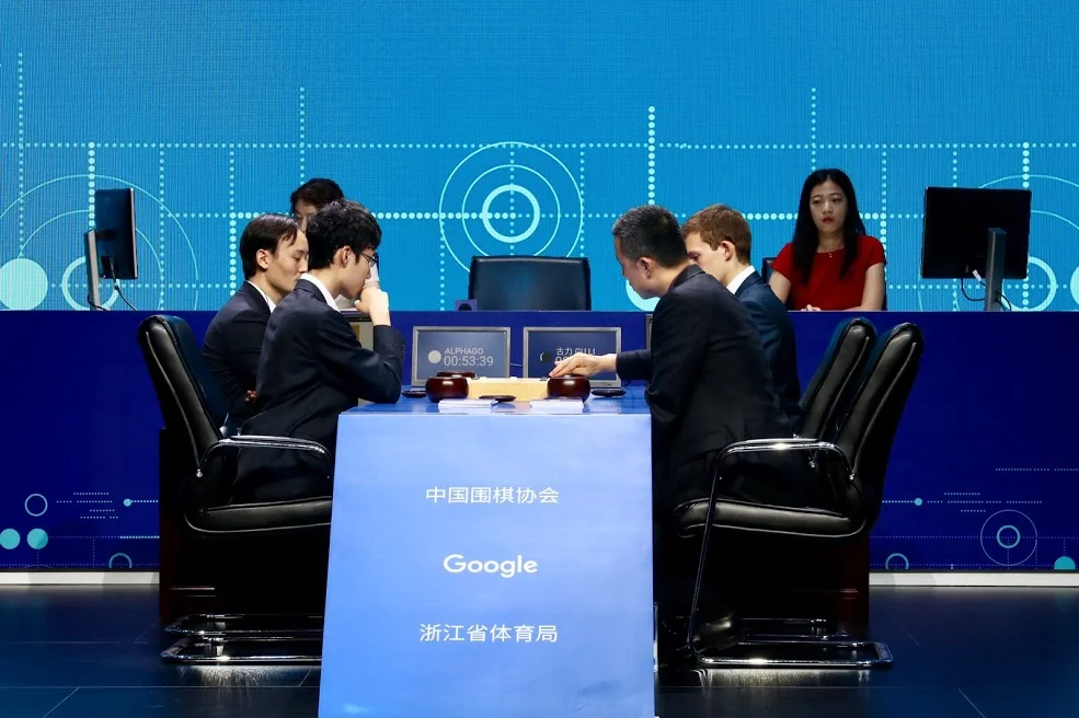 A group of people sit at a table