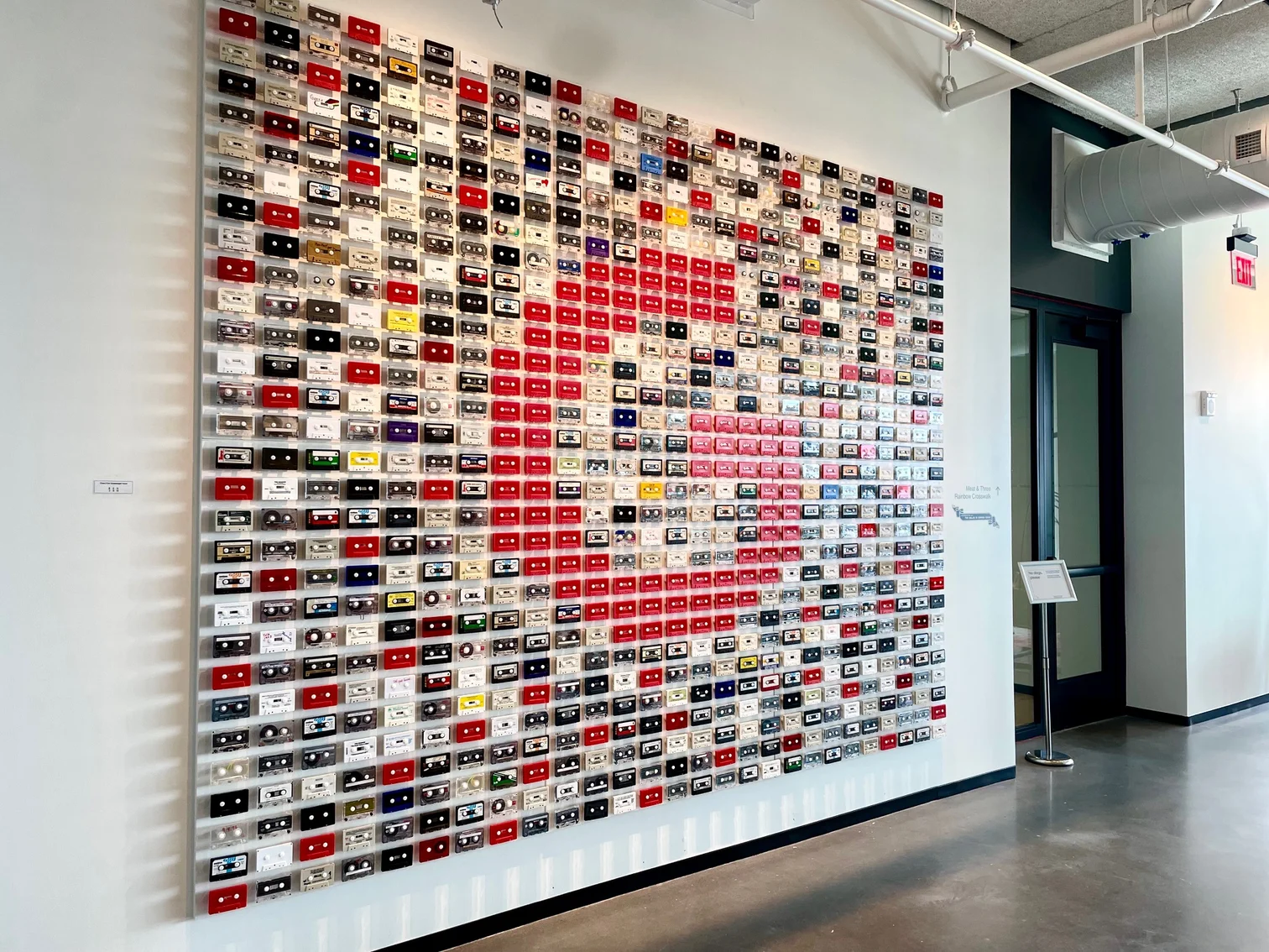 An art installation of cassette tapes shaped into a “G”